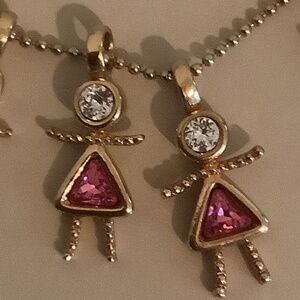 Chain and boy and girl charms.   $15 for charm $15each charm